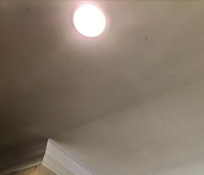 smoke damage on ceiling of apex home due to kitchen fire
